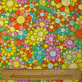 Algodón estampado flower power rosa fondo verde