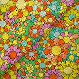 Algodón estampado flower power rosa fondo verde