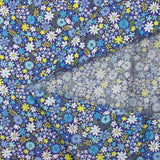 Cotton printed meadow in flowers blue indigo background