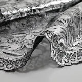 Dentelle festonnée impression argentée fond noir