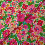 Popeline de coton imprimée valse florale fuchsia et vert fond ficelle