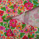 Popeline de coton imprimée valse florale fuchsia et vert fond ficelle