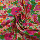 Popeline de coton imprimée valse florale fuchsia et vert fond ficelle
