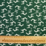 Popeline de coton imprimée Rennes du père Noël fond vert