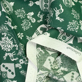 Cotton poplin printed Christmas Pampille Green background