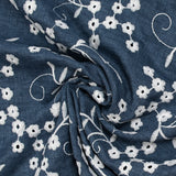 Twill de polyester embroidered marguerite background navy
