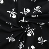 Coton imprimé les pirates de l’au-delà fond noir