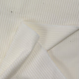 Pana de algodón blanco roto de 3 mm.