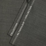 Light gray fantasy wool blend suit fabric with black background