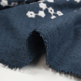 Twill de polyester embroidered marguerite background navy