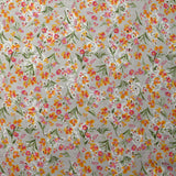 Broderie anglaise imprimée petites fleurs rose et jaune fond blanc