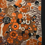 Jersey de viscose imprimé champ de fleurs orange et marron fond beige