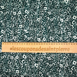 Printed muslin satin band flowers forest green background