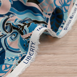 Coton liberty ® Elea Sun bleu et vieux rose au mètre