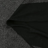 Jersey de polyester irisé argenté fond noir