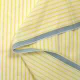 Coton tissé-teint Rudy rayé jaune beurre fond blanc