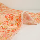 Crépon viscose fleur corail fond jaune