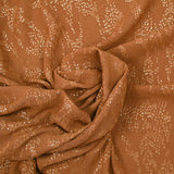 Gold leaf printed muslin with camel background