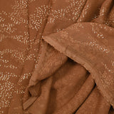 Gold leaf printed muslin with camel background