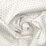 Piqué de coton imprimé coeur camel fond blanc