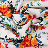 Viscose imprimée bataille de fleurs fond blanc