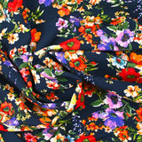 Viscose imprimée bouquet de fleurs de Sophie fond marine