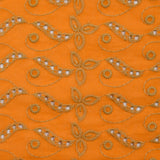 Broderie anglaise festonnée beige Éléonore fond orange