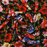 Viscose imprimée lien floral rouge fond noir