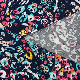 Viscose imprimée pensée animale corail et turquoise fond marine