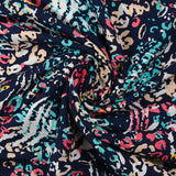 Viscose imprimée pensée animale corail et turquoise fond marine