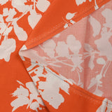 Viscose imprimée silhouette florale fond orange