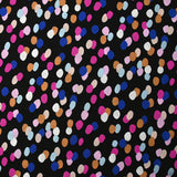 Viscose imprimée confettis magenta, camel et bleu roi fond noir