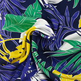Viscose imprimée végétation tropicale jaune et vert fond marine