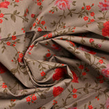 Coton imprimé fleur rouge fond taupe