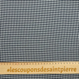 Polyester muslin with small navy and white tiles