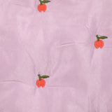 Matelassé pommes brodées fond mauve