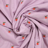 Matelassé pommes brodées fond mauve