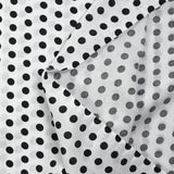 Viscose imprimée à pois 8mm noir fond blanc