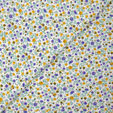 Viscose imprimée jardin secret violet et moutarde fond blanc