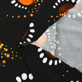 Maille de viscose satinée imprimée éclipse orange fond noir
