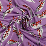 Maille de viscose satinée imprimée brin de muguet fond mauve