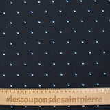 Cotton jersey printed with polka dots on a midnight blue background