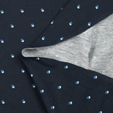 Cotton jersey printed with polka dots on a midnight blue background