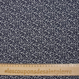 Jersey de algodón estampado con ramas de árboles blancas y fondo azul medianoche