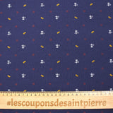 Jersey de algodón estampado café y baguette con fondo índigo