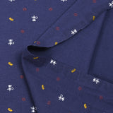 Jersey de algodón estampado café y baguette con fondo índigo