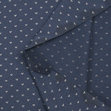 Cotton jersey printed trio of polka dots on navy background