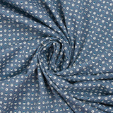 Cotton jersey printed circles and half-moons cart blue background
