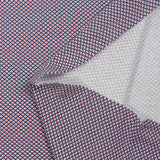 Cotton jersey printed red polka dots with navy circle and white background
