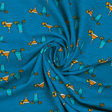Cotton jersey cocktail print with turquoise background